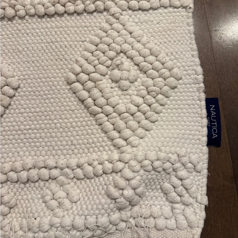 Nautica Cream Textured Bath Mat with Tassels